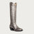 Silver metallic cowboy boot on a white background