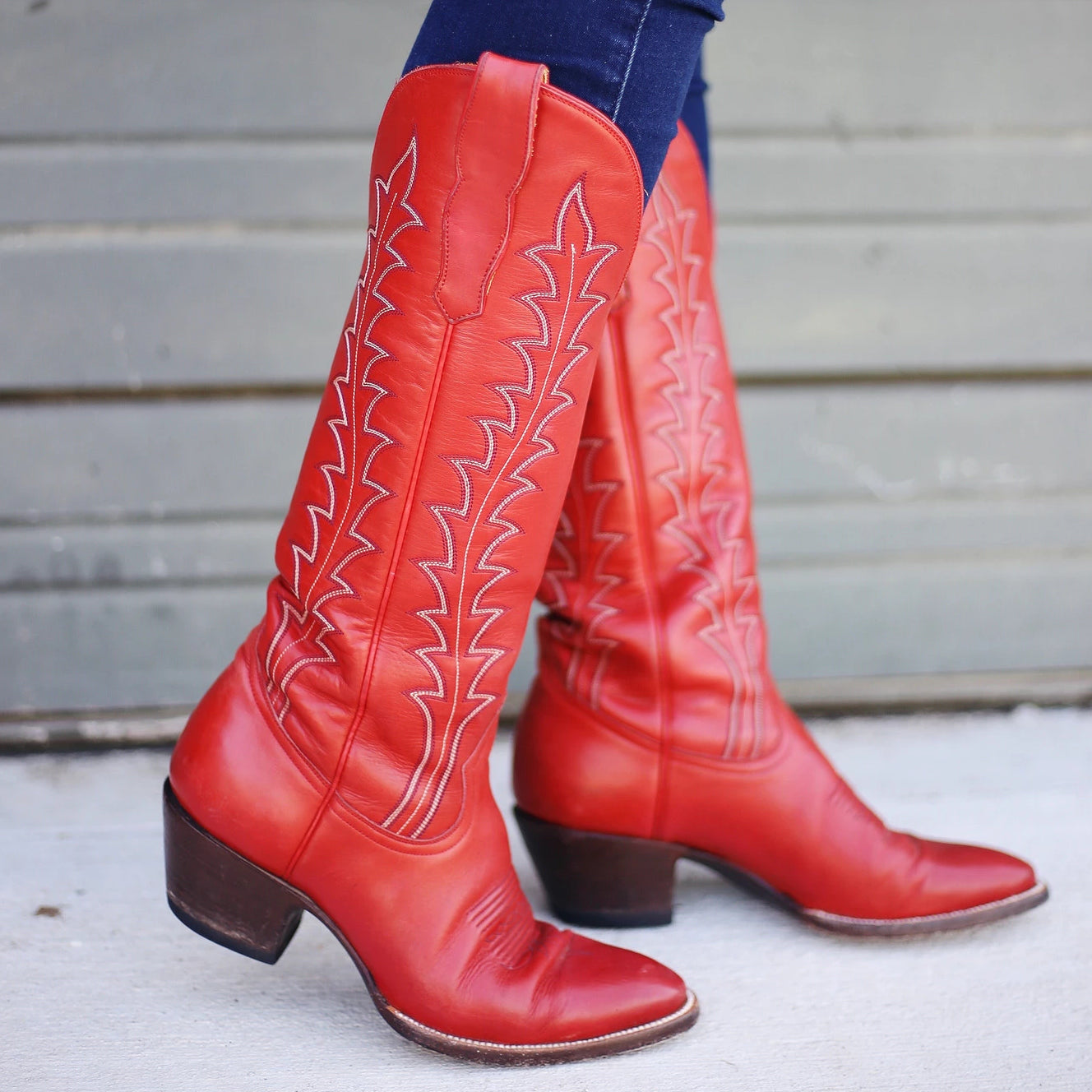 Glamorous western boots in dark red
