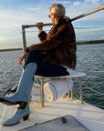 woman sitting wearing CITY Boots Inwood powder blue boots